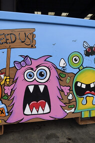 An artistically designed giant dumpster 