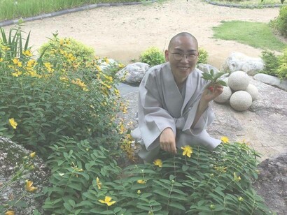 Korean market happily tending to the garden
