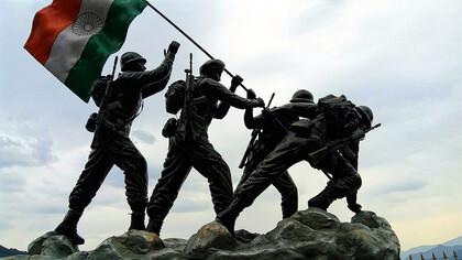 The Indian flag, the Indian army, and statues of national heroes symbolize the country's strength, pride, and rich history