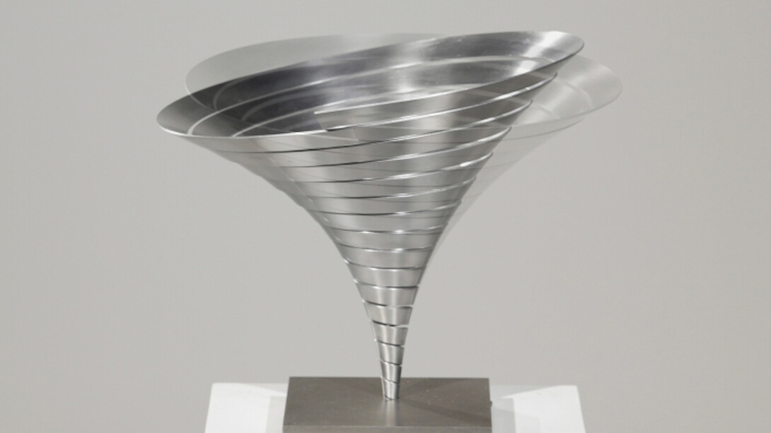 Martin Willing (b. 1958), Parabolkegel groß, 1991, Duraluminum, water jet cut, curved, prestressed, embedded in titanium plate, 11 3/8 (H) inches, 14 1/8 inches diameter. Courtesy of Hollis Taggart Galleries