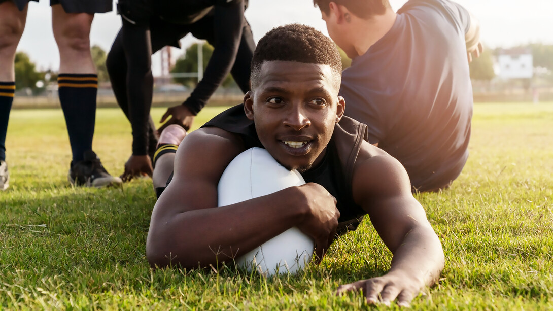 Exhilarating Kenya 7's rugby as men compete fiercely on the field in Kenya, showcasing the nation's sporting prowess and excitement of rugby action