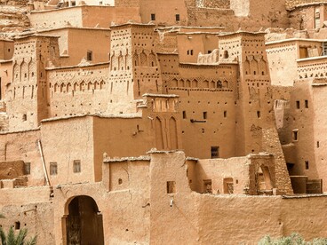 The weathered façade of a kasbah in Aït Benhaddou, reflecting the permanence of Morocco's historical identity