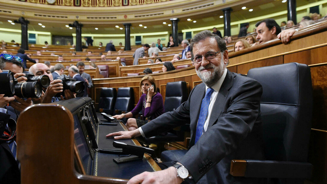 Mariano Rajoy Brey en su escaño, tan contento