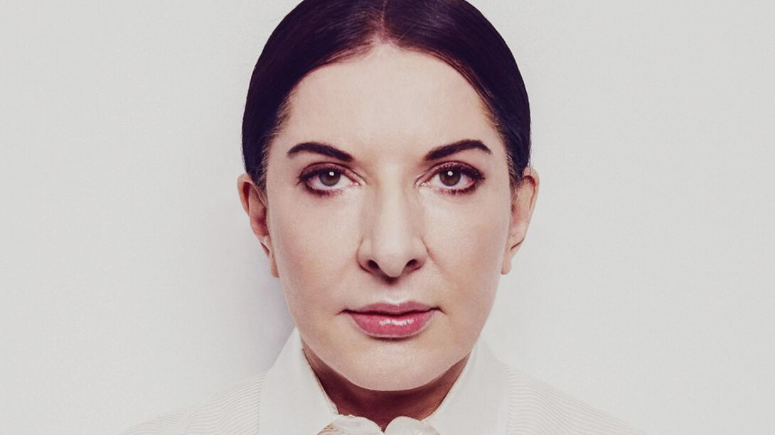 Marina Abramović, a Serbian conceptual and performance artist. Her work explores body art, endurance art, the relationship between the performer and audience, the limits of the body, and the possibilities of the mind