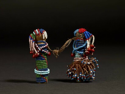 Pair of Sotho Gun Cartridge Dolls, Glass, brass and leather, South Africa, late 19th Century © The Trustees of the British Museum