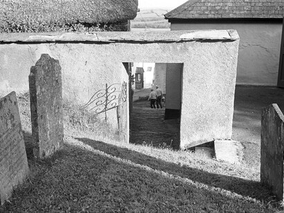 Churchyard at Winkleigh, Photograph by James Ravilious, image courtesy of the Beaford Arhive © Beaford Arts