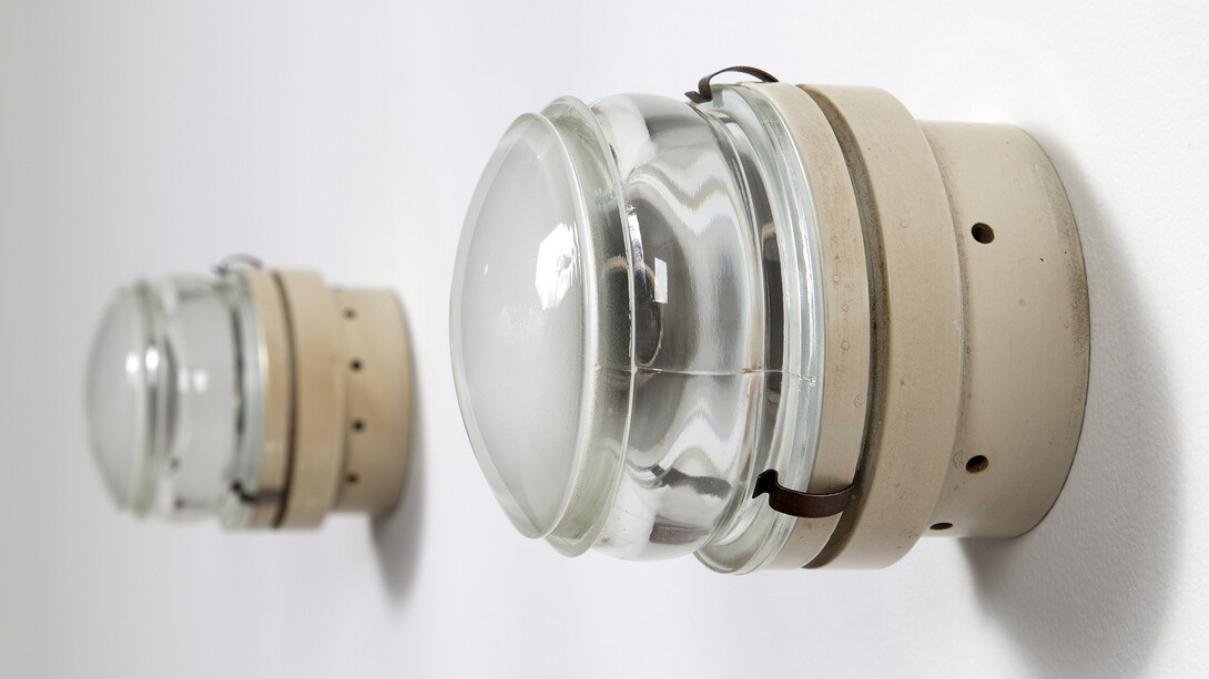 Pair of "1148 Fresnel" lamps designed by Joe Colombo for O Luce, Italy, 1964-1965. 4.5" W x 4.5" H x 3.75" D. Photo by Sherry Griffin for R & Company