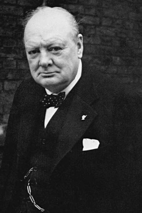 Winston Churchill former prime minister of the UK, glances at the camera