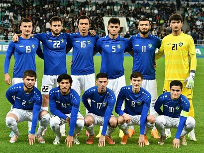 Uzbekistan’s national football team takes on Ukraine in a 2011 international match