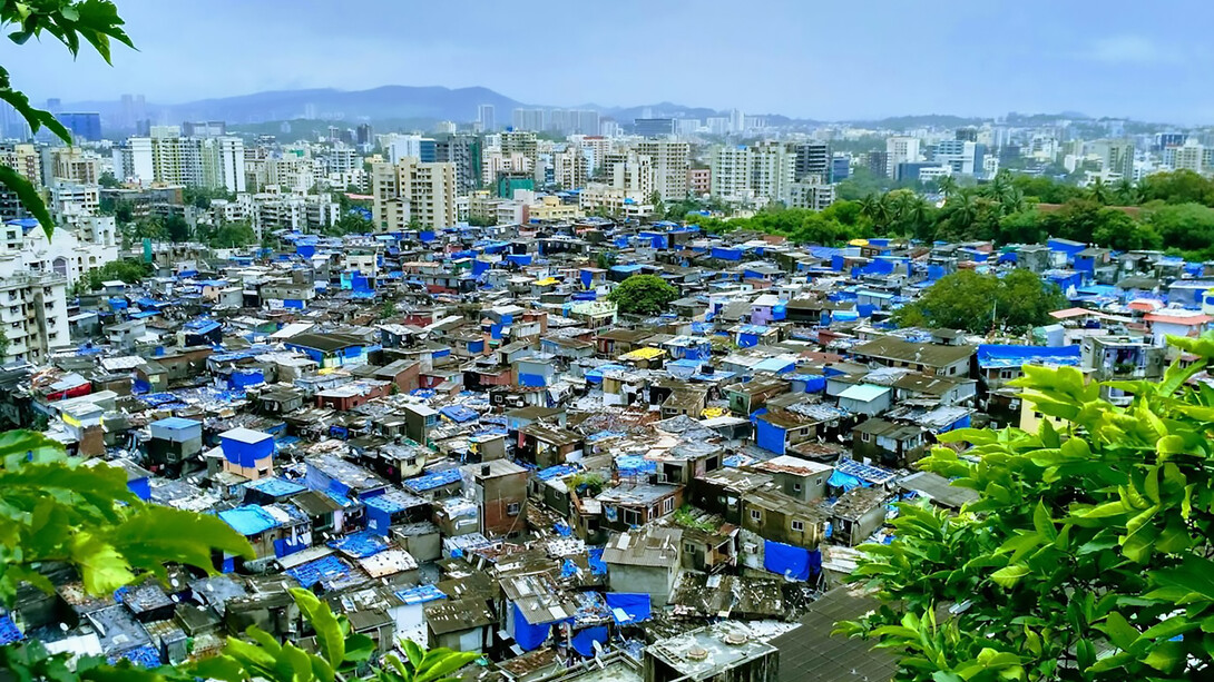 Houses and buildings under the clear blue sky during the day in Andheri West, Mumbai, Maharashtra, India