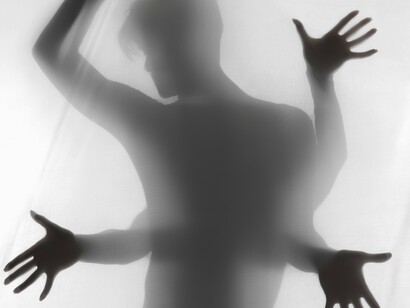 The shadow self watches quietly, holding the words we never said