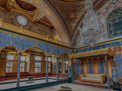 The Imperial Hall at Topkapi Palace, Istanbul, is a magnificent chamber adorned with exquisite Iznik tiles in rich blues and emerald greens, it was once the heart of the Ottoman Empire, where tales of power and luxury converged. Today, it stands as a testament to the opulence of the past and is a must-visit historical site for tourists