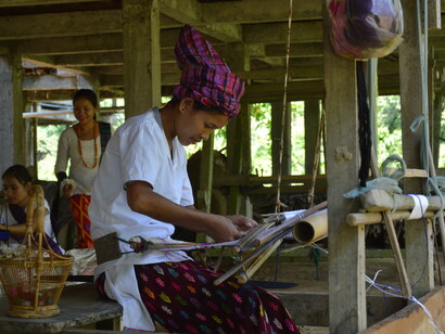 Tribal Singpho artisans with their traditional heirloom