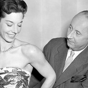 Christian Dior with model Dorothy Emms, 1957, (c) 2004 TopFoto