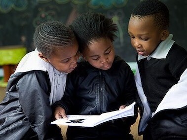 South African children busy learning at school