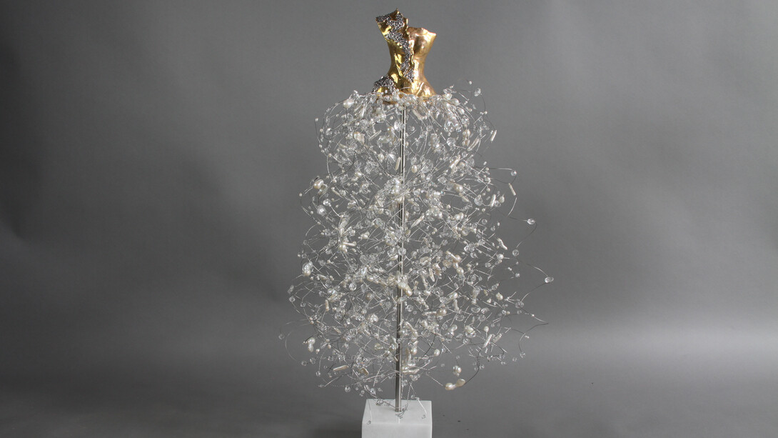 Estella Fransbergen, Clay Yellow Gold with white gold texture overglaze one shoulder, freshwater pearls, Swarovski’s, quartz, 32 x 13 x 13 in
