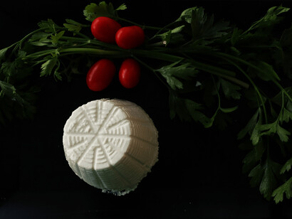 In Neapolitan dialect the end vowel is barely pronounced and "ricotta" becomes "ricott'"