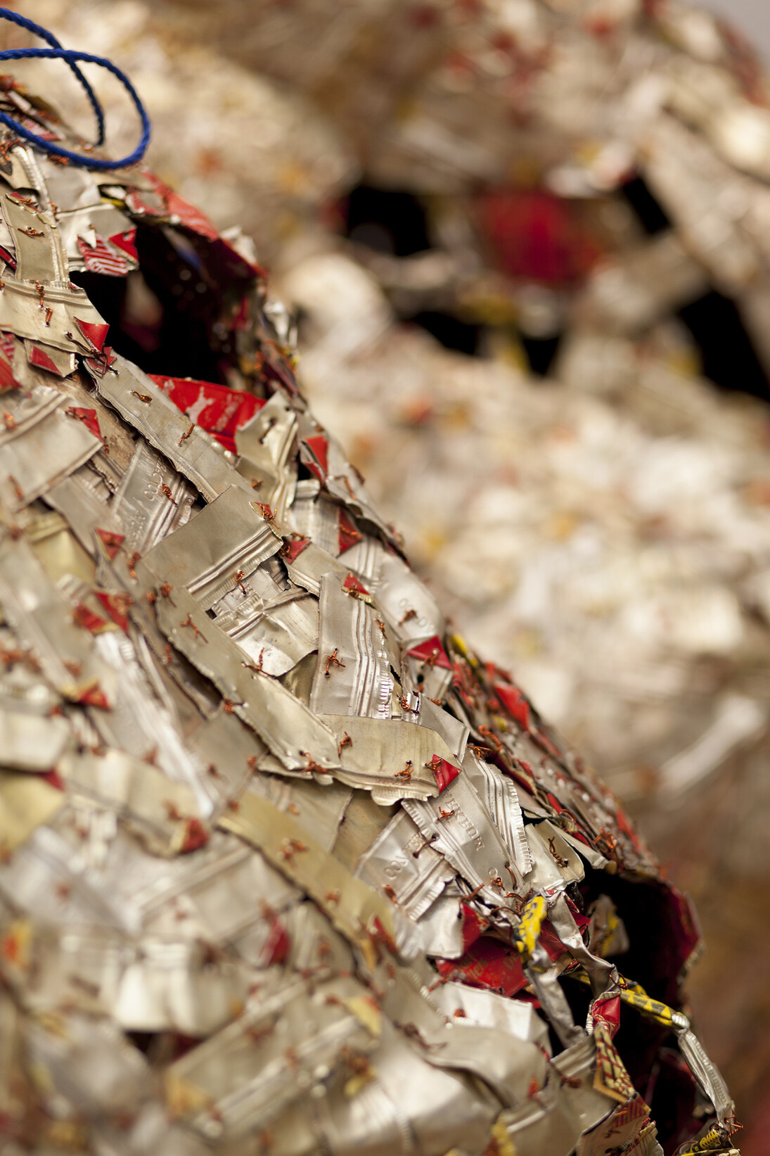 El Anatsui, AG + BA, detail 4, 2014, Installation, Aluminium and copper wire and nylon string, dimensions variable, Photo Jonathan Greet, Image courtesy October Gallery London