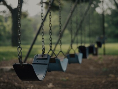 A swarm of swings perfectly placed for someone to go up and down as much as they please