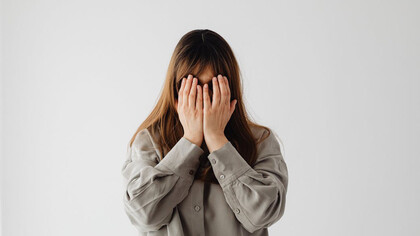 In a world where stress has become the norm, the woman's distress highlights the emotional toll of constant connectivity and high expectations