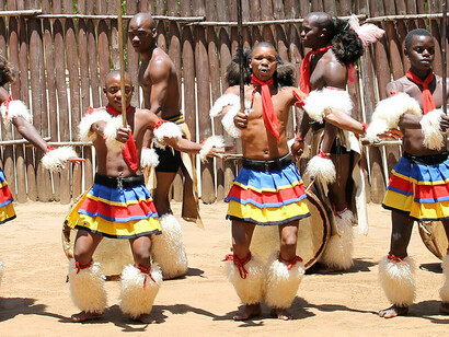 The Eswatini tribe dancing during their annual festival. Every year the people of Swaziland celebrate Ncwala, the festival of the first fruits, vibrant music & arts festival that has fast established an excellent international reputation