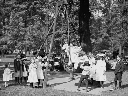 Children swinging in a playground or park