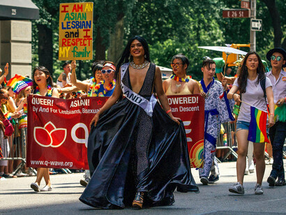 Crowd marching in unity at the Pride Parade in New York City, USA