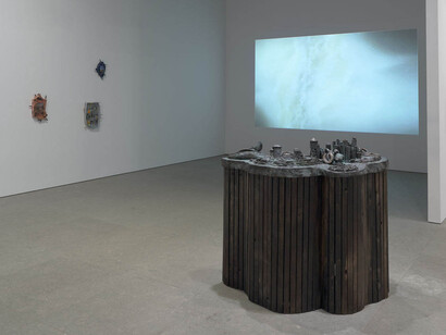 Installation view of Between the Waters (Whitney Museum of American Art, New York, March 9, 2018-). From left to right, back to front: Erin Jane Nelson, Isle de Jean Charles, 2018; Erin Jane Nelson, Chauvin Garden, 2018; Erin Jane Nelson, Montegut, 2018; Carolina Caycedo, Esto No Es Agua/This Is Not Water, 2015; Lena Henke, City Lights (Dead Horse Bay), 2016; Carolina Caycedo, Cosmotarraya Ver-o-Peso, 2016; Carolina Caycedo, Cosmotarraya Cuiabá, 2016. Photograph by Ron Amstutz