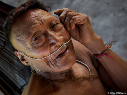 Raya, a Nahua man. More than half his people were wiped out after their lands were invaded by oil companies and loggers. ©Johan Wildhagen