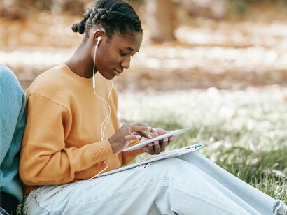A woman enjoying her latest podcast episode on mental health