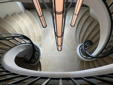 The historic double-helix staircase inside the Bourse de Commerce in Paris, France
