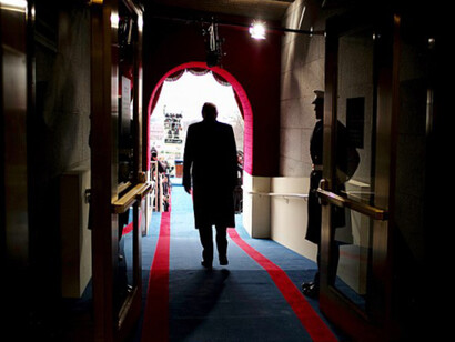 President Donald Trump made his way to the podium at his inauguration, flanked by his family, as the ceremony marked the beginning of his controversial tenure as the 45th President of the United States