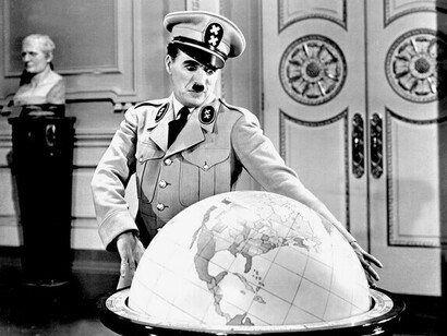 Charlie Chaplin, The Great Dictator (1940). Power does not need to be explained: it is displayed, ordered, and made visible so as not to be challenged