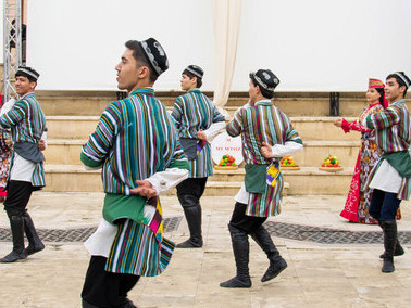 The Andijan Polka dancers entertain tourists