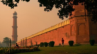 Side wall and minaret of the Badshahi Mosque in Lahore, Punjab, Pakistan