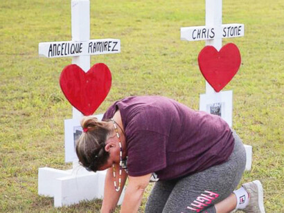 A mother mourning after a school shooting in Santa Fe, Texas