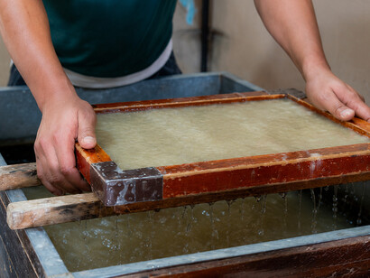 Traditional Chinese papermaking is an ancient handcrafted technique, traditionally attributed to Cai Lun around 105 CE, that uses plant fibers such as mulberry bark, hemp, bamboo, and rice straw to produce durable paper. The process includes soaking, boiling, beating the fibers into pulp, molding, pressing, and drying, and is best represented by the carefully crafted Xuan paper, now recognized as part of intangible cultural heritage