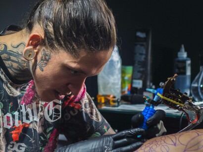 A tattoo artist following his soul-aligned business model by opening up his own store