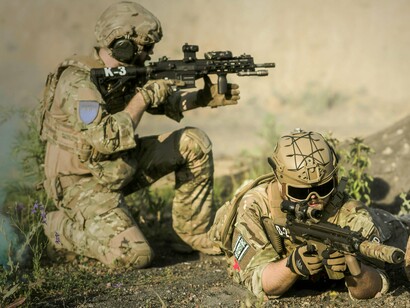 Where men dominate, borders harden, weapons multiply, and peace becomes a negotiation through force