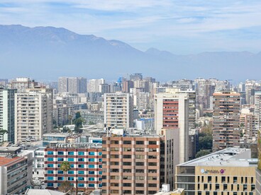 Santiago, Chile, with the Andes overlooking its growing cityscape, symbolizing the country’s journey from dictatorship to democracy