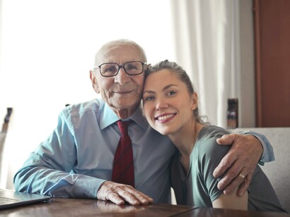 A grandfather and granddaughter