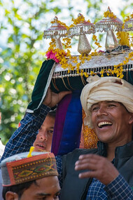A group of people in traditional Himachali attire gathered in a circle, Kullu Valley, Himachal Pradesh, India