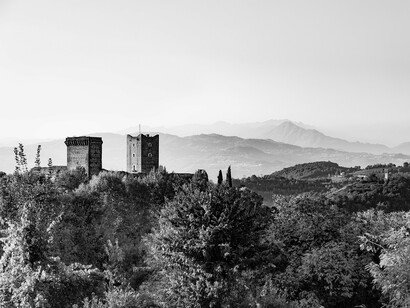 La Villa, Romeo’s castle, stands quiet beneath the morning haze—its stone gaze fixed forever on Bellaguardia, across the valley, where love was imagined but never fulfilled