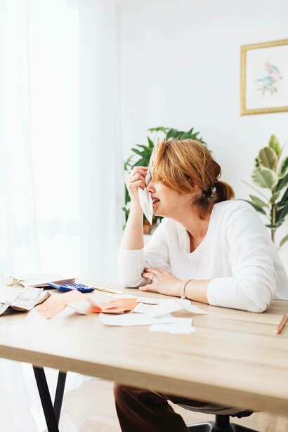 Woman in tears after seeing her bills