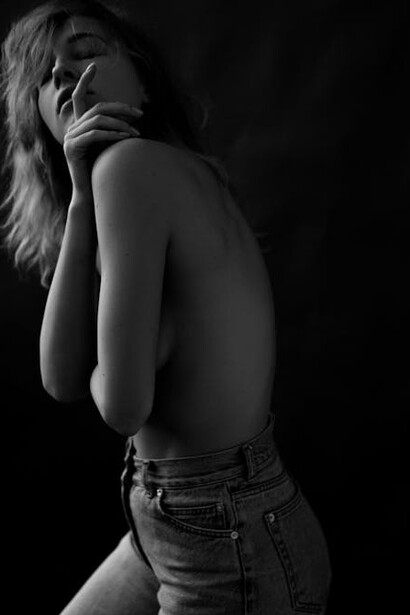 Her carefree demeanor and confident stance highlight the beauty of connecting with pleasure on a deeper emotional and mental level