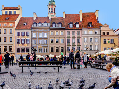 Colorful pastel buildings in the Old Town under a clear blue sky, Wrocław, Poland