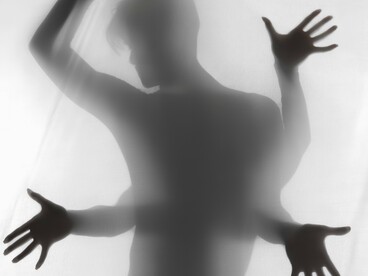 The shadow self watches quietly, holding the words we never said