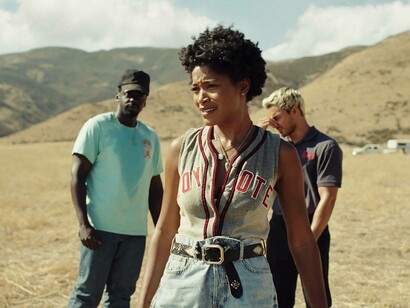 The cast of Nope (2022), are in the middle of a deserted field trying to find answers to their problem; the film was released in August