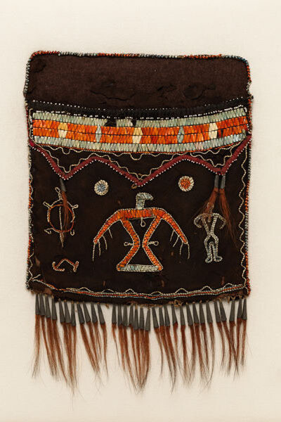 Date:ca. 1800
Geography:Possibly made in Ontario, Canada; Possibly made in Michigan, United States; Possibly made in Wisconsin, United States
Culture:Anishinaabe, possibly Mississauga Ojibwa
Medium:Native-tanned leather, porcupine quills, dye, glass beads, silk ribbon, metal cones, and deer hair
Dimensions:12 × 9 in. (30.5 × 22.9 cm)
Classification:(not assigned)
Credit Line:The Charles and Valerie Diker Collection of Native American Art, Promised Gift of Charles and Valerie Diker