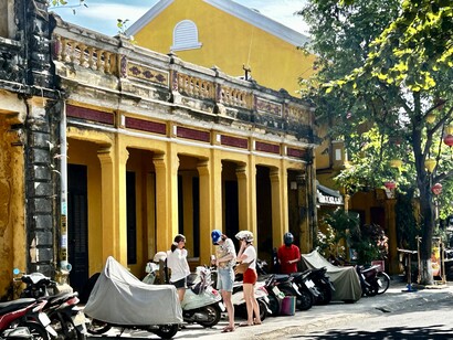 Charming old French quarter at Phan Bội Châu Street  in Hoi An showcasing authentic Vietnamese delicacies and architectural charm ©Alma Reyes